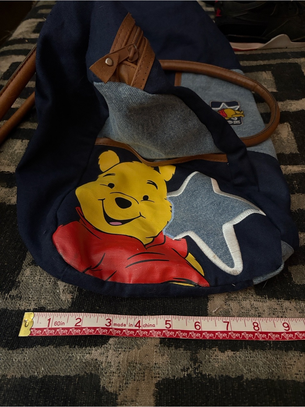 Disney Navy Sling Bag with Winnie the Pooh Print and Red Accent